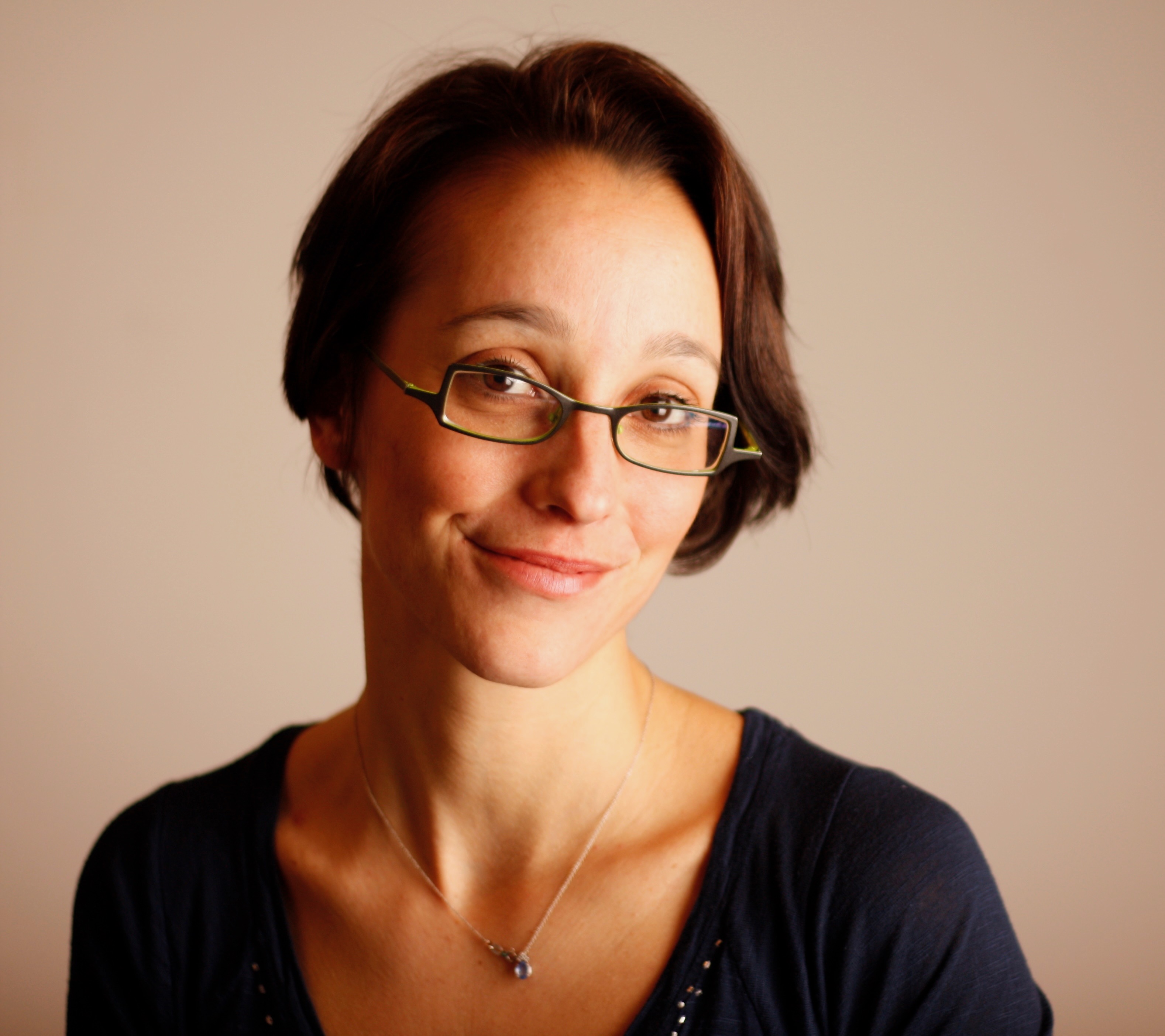 Professional headshot of the CommonSenz wellness coach